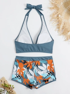 Bikini a vita alta con stampa tropicale e top allacciato al collo color turchese