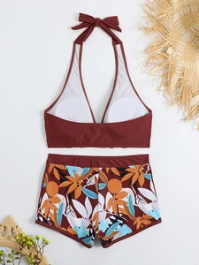Costume da bagno a due pezzi con top allacciato bordeaux e slip a stampa tropicale