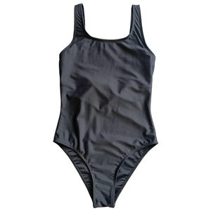 Close-up of the black one-piece swimsuit featuring a U-neckline and wide shoulder straps