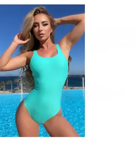 Close-up of a turquoise one-piece swimsuit featuring a high-cut leg and sleeveless design