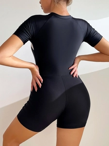 Women's black short sleeve one piece swimsuit with zipper for surfing and beach sports
