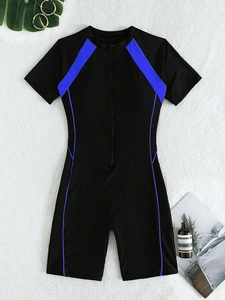 Detailed flat lay of black short sleeve one-piece swimsuit with blue side stripes and zipper