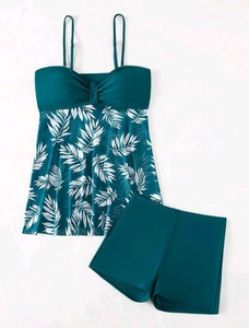 Close-up of high-waist tankini set with green leaf print mesh and boyshort bottoms