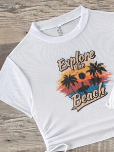 Detail of white mesh swim cover-up with beach print and drawstring hem design