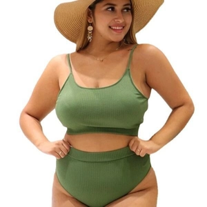 Detailed view of olive green ribbed bikini set with spaghetti straps and high waist
