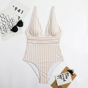 Close-up of V-neck striped one-piece swimsuit with flattering waist pleats and ruffles
