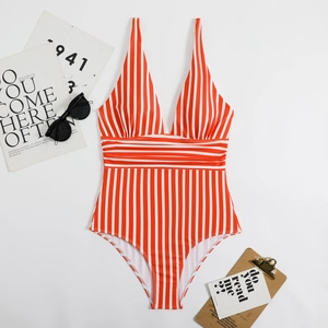 Deep V-neck one-piece swimsuit with vertical red stripes and slimming waist detail