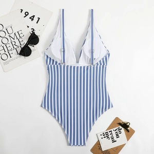 Detailed flat lay of a striped one-piece swimsuit with V-neck and adjustable straps