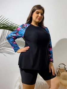Detail view of plus size long sleeve tankini top with tropical leaf and floral print