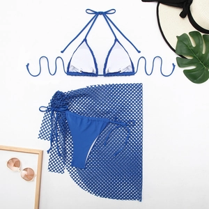 Royal blue three-piece bikini set with mesh sarong and halter top for vacation wear