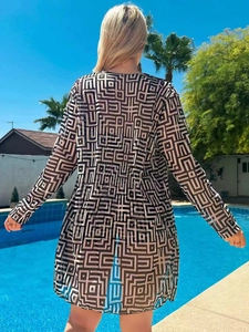 Sheer long-sleeved bikini cover-up featuring a bold black and white geometric maze pattern