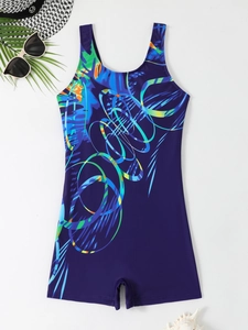 Detailed flat lay of a purple printed one-piece swimsuit with beach vacation accessories