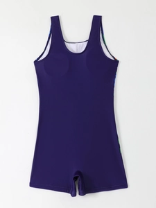 Detail of dark purple one-piece swimsuit with side geometric prints and boyleg cut