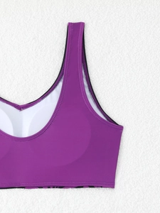 Close-up of purple sports bikini top featuring U-neck design and removable soft chest pads