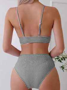 Rear view of high-waisted bikini set with classic black and white thin stripes pattern