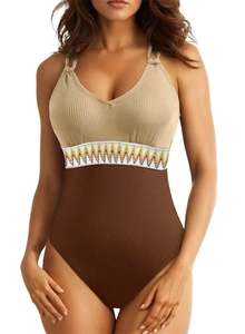 Detail of earthy tone one-piece swimsuit featuring ribbed fabric and ethnic waist trim