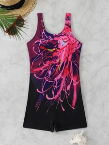Flat lay of sporty one-piece floral swimwear with summer beach accessories on marble