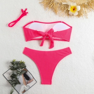 Detail of rose pink honeycomb texture bikini with bow-tie back and removable chest pads
