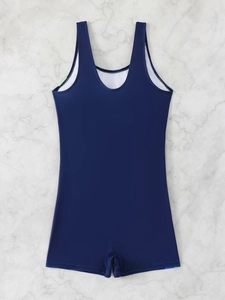 Navy blue one-piece boyleg swimsuit shown flat on white marble background