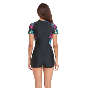 Back view of short sleeve one-piece swimsuit with colorful geometric print sleeves