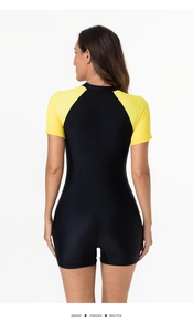Back view of short sleeve one-piece swimsuit in black and yellow color block design