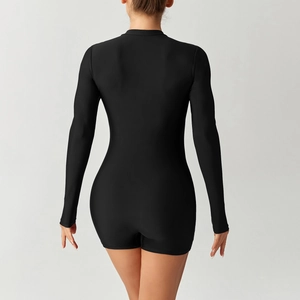 Rear view of black long sleeve one-piece surfing swimsuit with boyleg cut for women