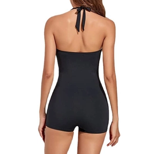 Back view of a black one-piece halter boy-leg swimsuit featuring an open back design