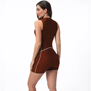 Detail of slim fit one-piece brown athletic romper with contrast stitching on the back