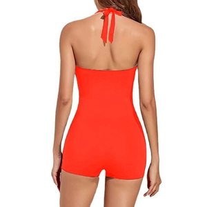 Detailed back view of a solid red halter one-piece swimsuit with boyshort bottom