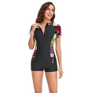 Detail of front zipper and colorful graffiti print on short sleeve one-piece swimsuit