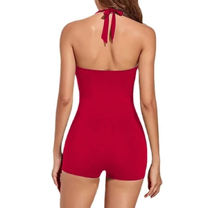 Detailed back view of red halter one-piece swimsuit with self-tie bow and open back design