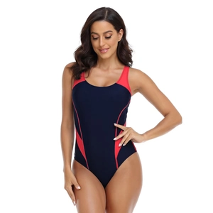 Detail of navy one-piece swimsuit featuring red side splicing and sporty contrast stitching