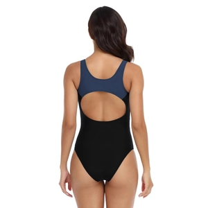 Detail view of athletic one-piece swimsuit featuring blue and black colorblock and racerback cut