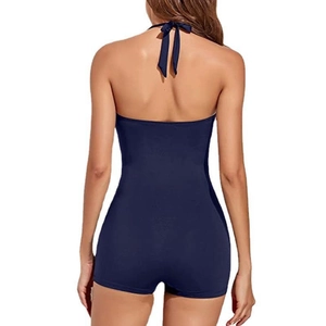 Navy blue halter neck one-piece swimsuit with back bow and boyleg cut back view