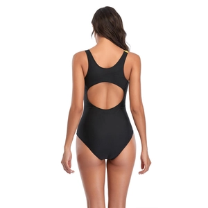 Detailed back view of a black athletic one-piece swimsuit with cutout and yellow trim