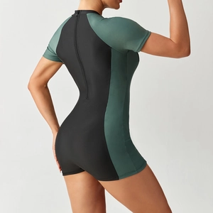 Detail view of the back zipper and ergonomic stitching on this sleek long-sleeve surf suit