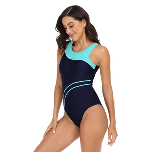Detail of athletic one-piece swimsuit featuring slimming blue colorblock side panels
