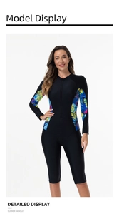Détail d'un maillot de bain manches longues avec zip et imprimé feuilles tropicales