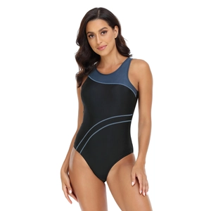Detail shot of one-piece swimsuit with athletic color-block splicing and high-cut leg