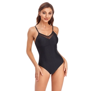 Detail of black one-piece swimsuit with mesh paneling and delicate spaghetti straps