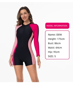 Detail view of the long sleeve rash guard featuring pink color blocking and a front zipper