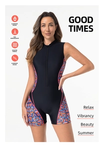 Detail of athletic one-piece swimsuit with front zipper and vibrant geometric side patterns