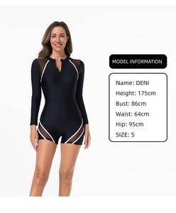 Front view of long-sleeved one-piece swimsuit with white contrast lines and mesh panels
