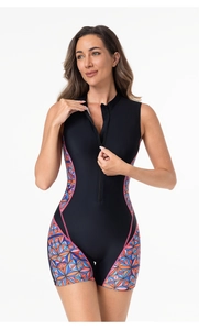 Detail of athletic one-piece swimsuit featuring front zipper and colorful geometric print