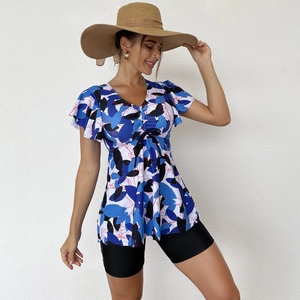 Detail of floral tankini top with V-neckline ruffle sleeves and adjustable drawstring