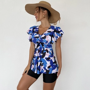 Close-up of V-neck floral tankini top with drawstring and ruffled sleeves detail