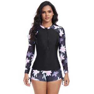 Women's two-piece long sleeve surfing swimsuit set with floral print and front zipper