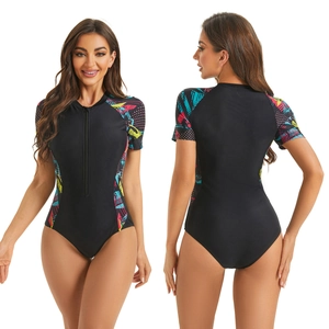 Detailed front and back view of short sleeve one-piece swimsuit with front zipper and prints