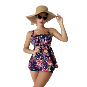 Women's floral print tankini set with skirted bottom and adjustable halter straps