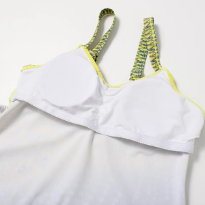 Detail view of the bikini top's adjustable straps and built-in padded bust support